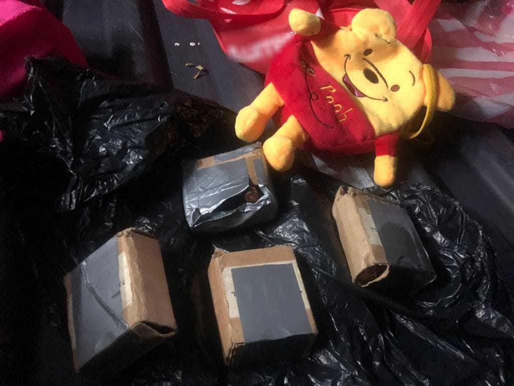 Oso de peluche con cartuchos ocultos